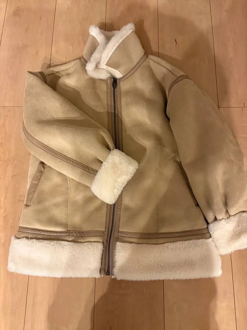 Thumbnail of Kids' beige coat