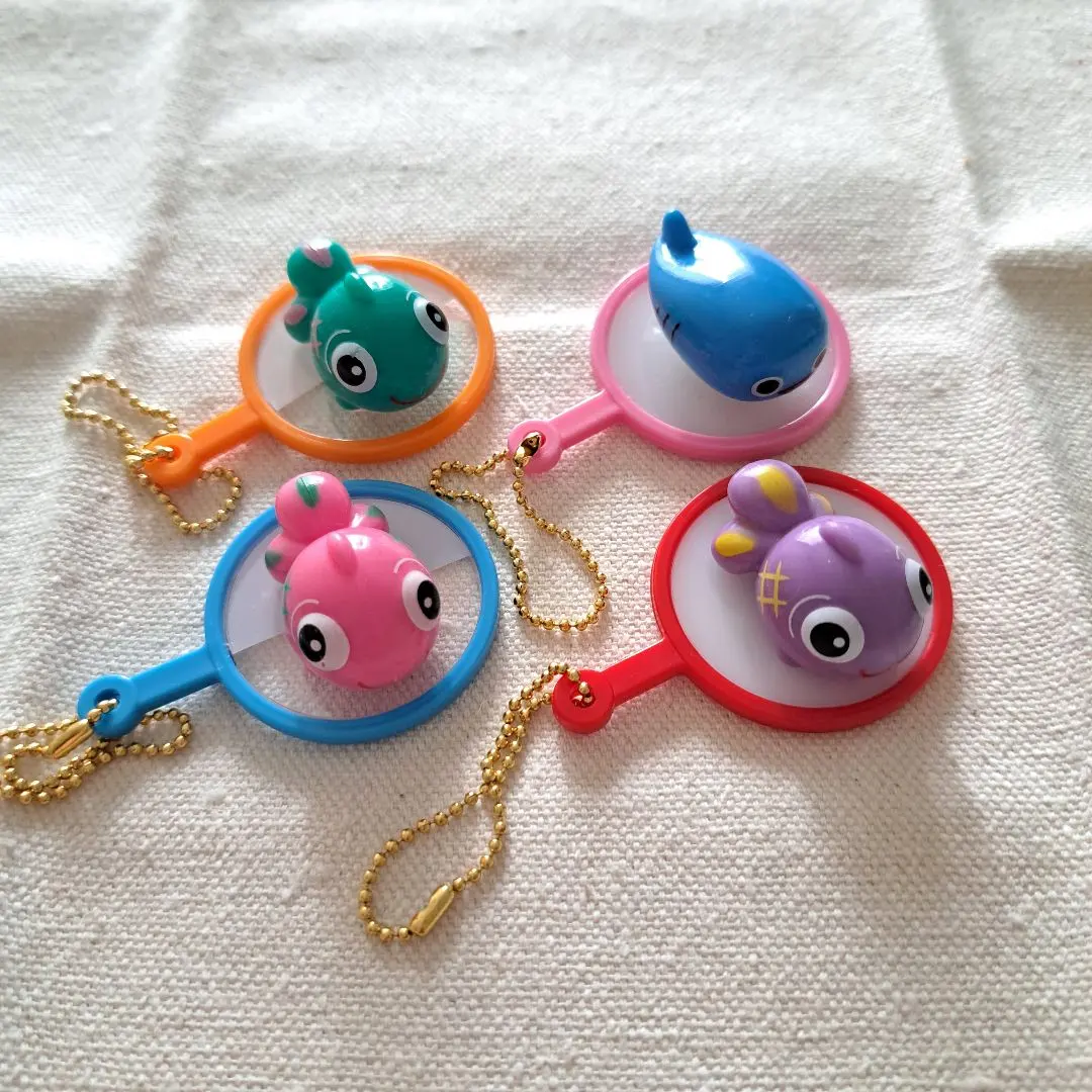 Thumbnail of Goldfish scooping fish keychain