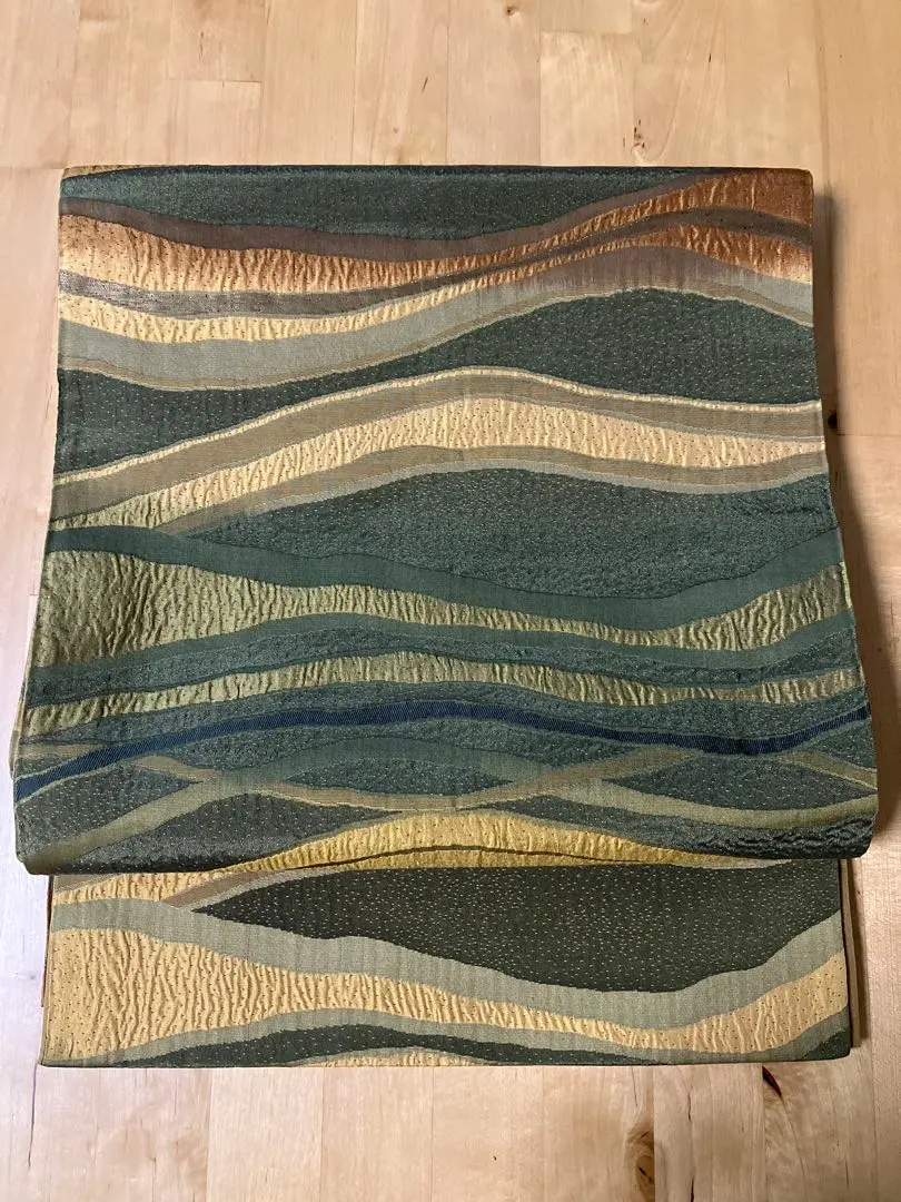 Thumbnail of Wavy pattern glossy obi sash, full-length, puffed weave, green tones