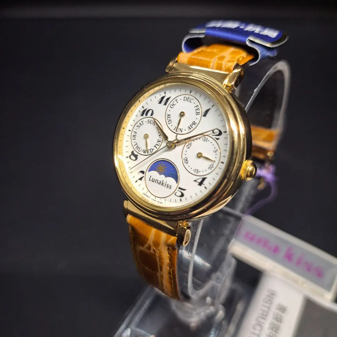 VINTAGE ALBA V33F-6860 SUN&MOON クォーツ腕時計 s-l400.jpg