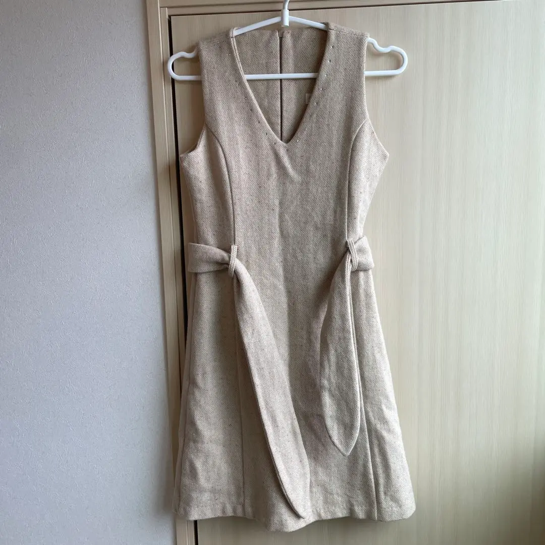 Thumbnail of Beige sleeveless V-neck dress