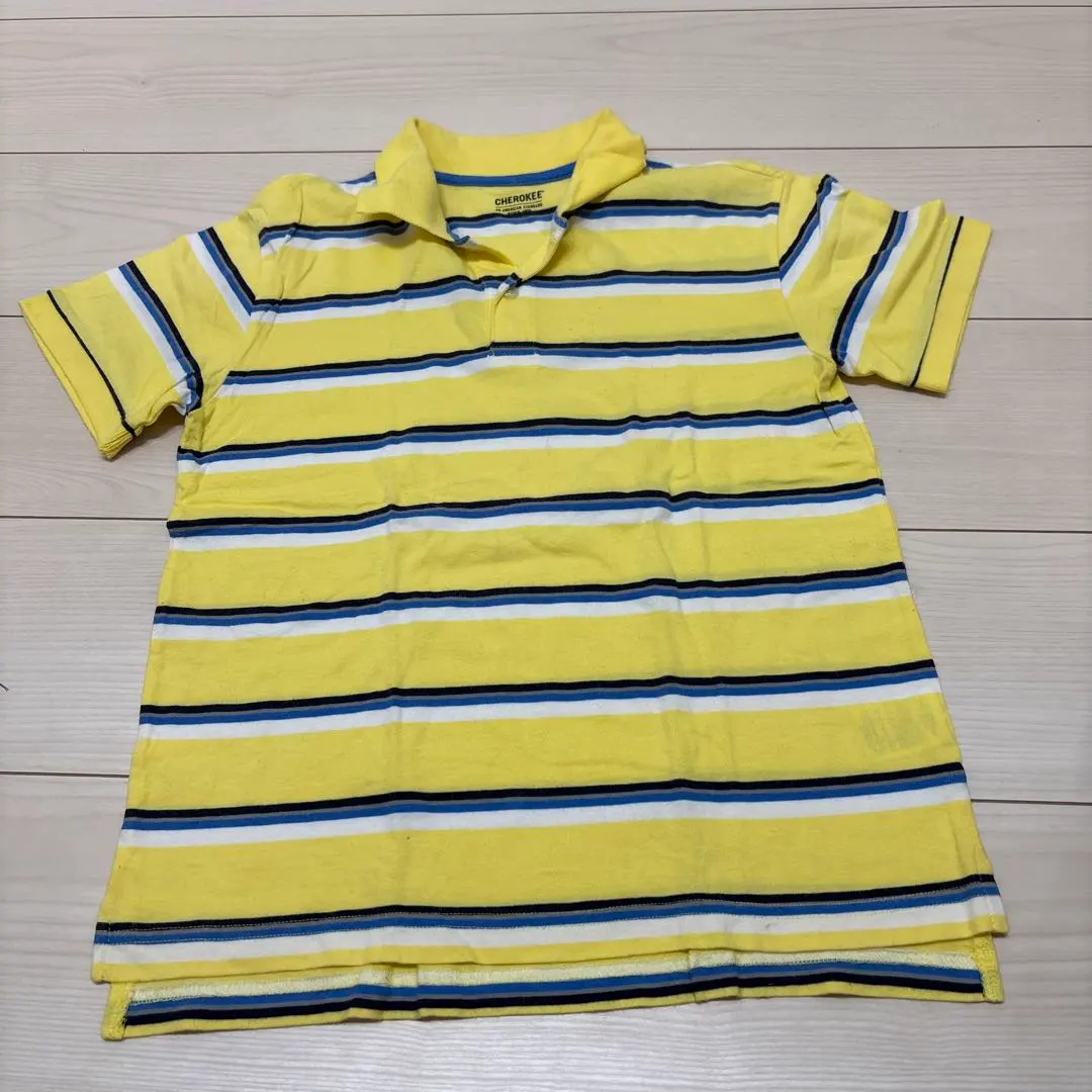 Thumbnail of Yellow striped polo shirt, 140 cm