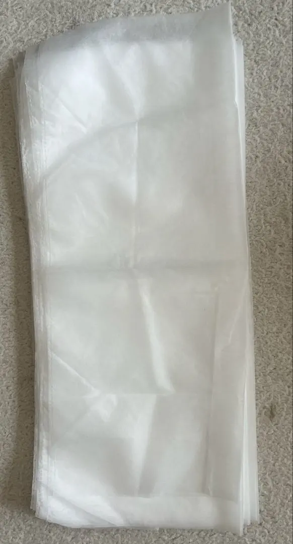 Thumbnail of White non-woven fabric, approximately 60cm x 50cm