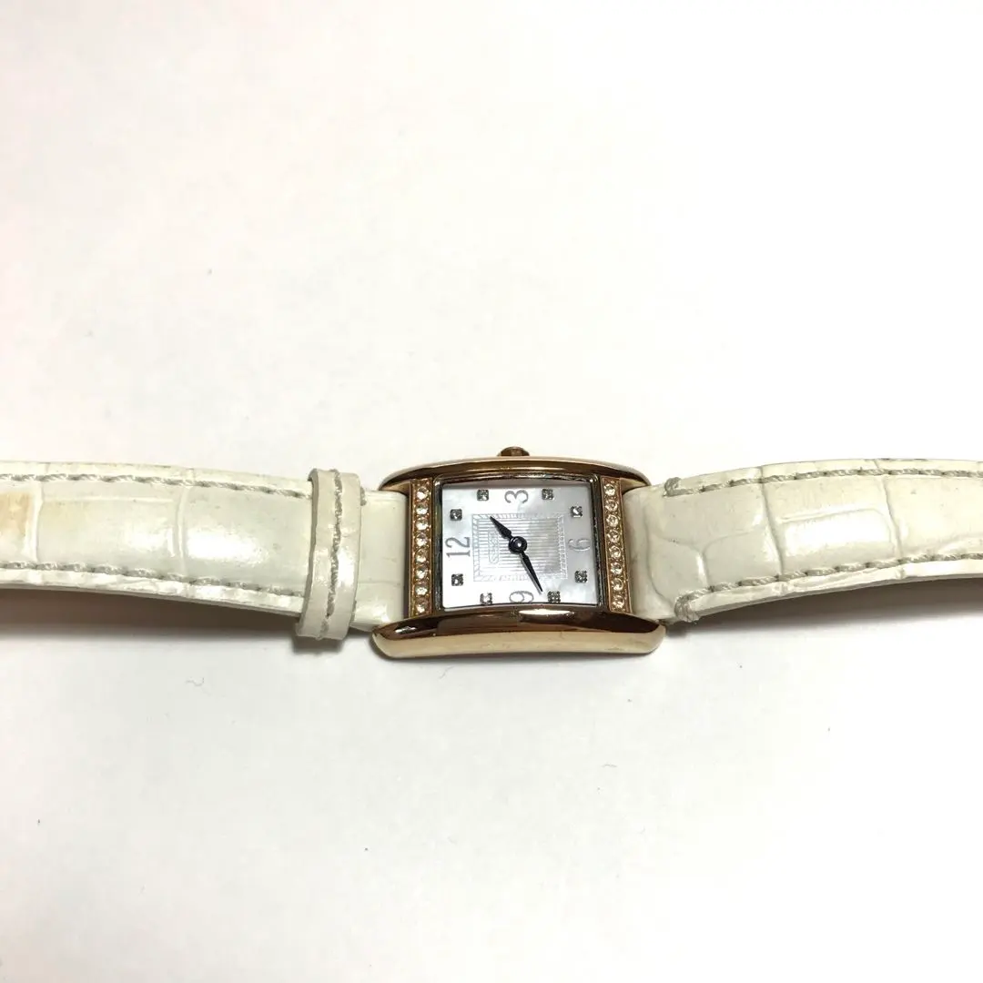 Thumbnail of COACH NEW YORK wristwatch with a stone-studded mother-of-pearl dial and a white strap for ladies
