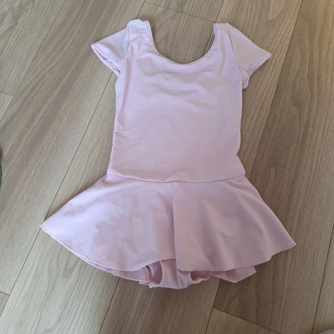 Thumbnail of Pink leotard with a flared skirt