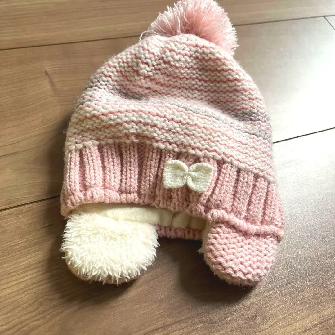 Thumbnail of Knit hat with pom-pom and ribbon motif, 44-46cm