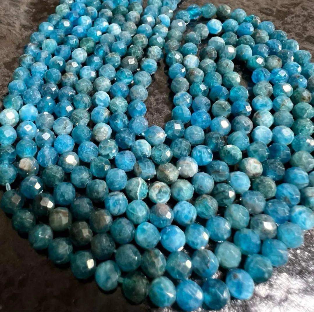 Thumbnail of C5188 High Quality Apatite Multi-faceted Round Cut 4mm 1 Strand