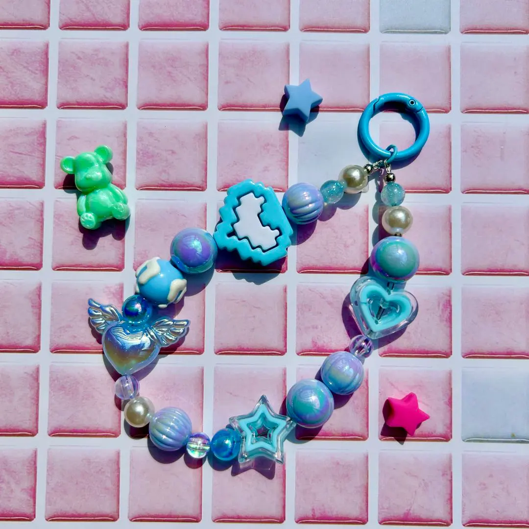 Thumbnail of Blue bead strap with heart and star motifs