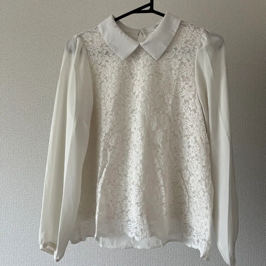 Thumbnail of Lace collared white long-sleeved blouse