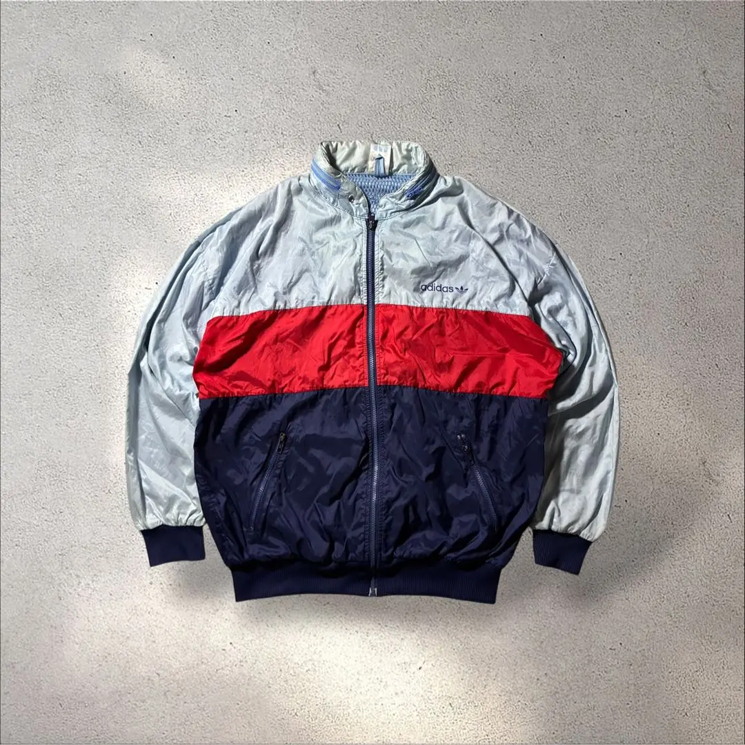 Thumbnail of 80s/90s Adidas nylon jacket, short length, light blue, red, navy, Trefoil