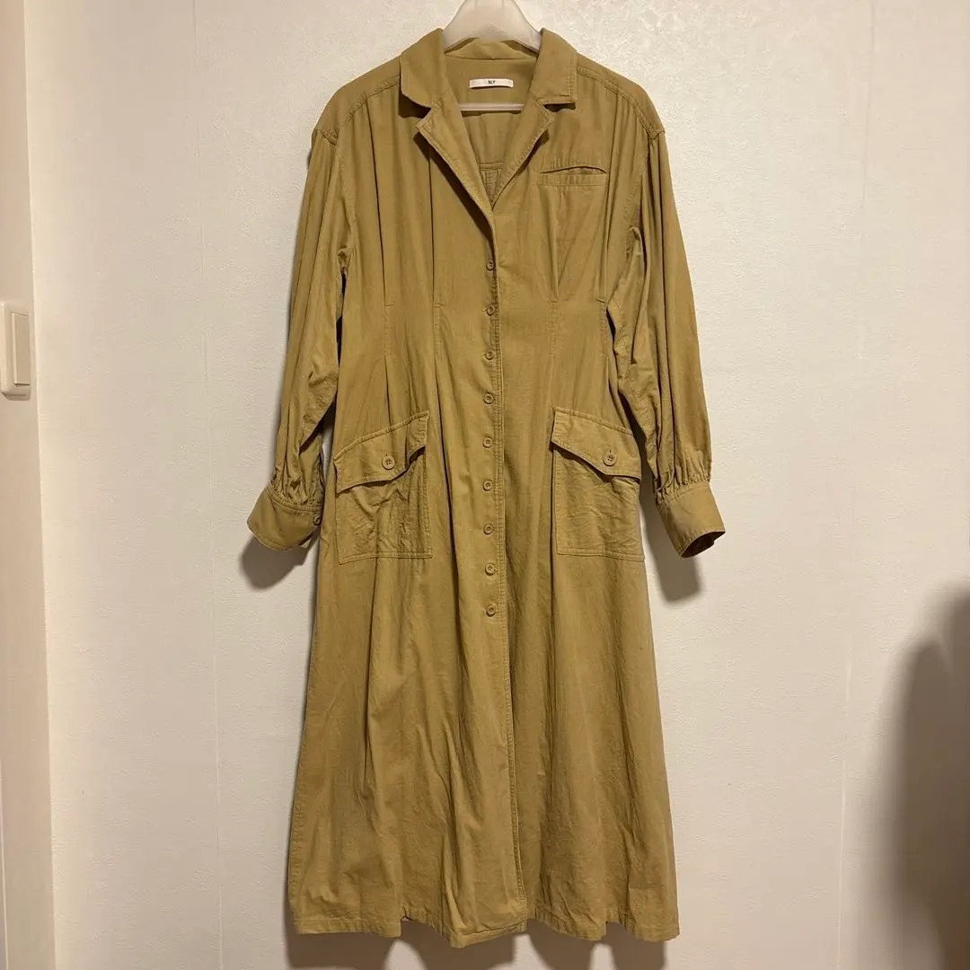 Thumbnail of Beige shirt dress with long sleeves and waist belt
