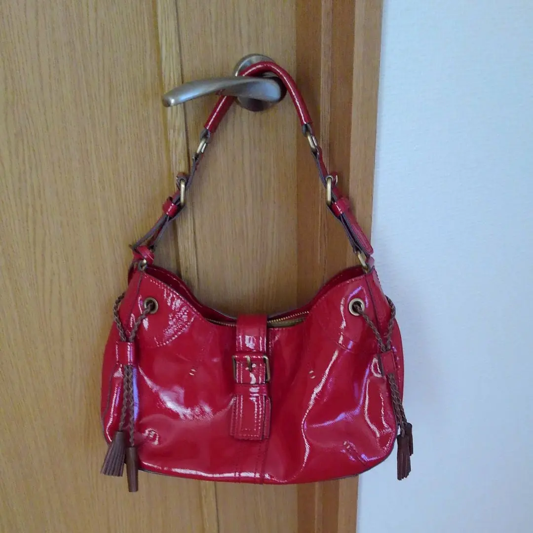 Thumbnail of Final price red shoulder bag.