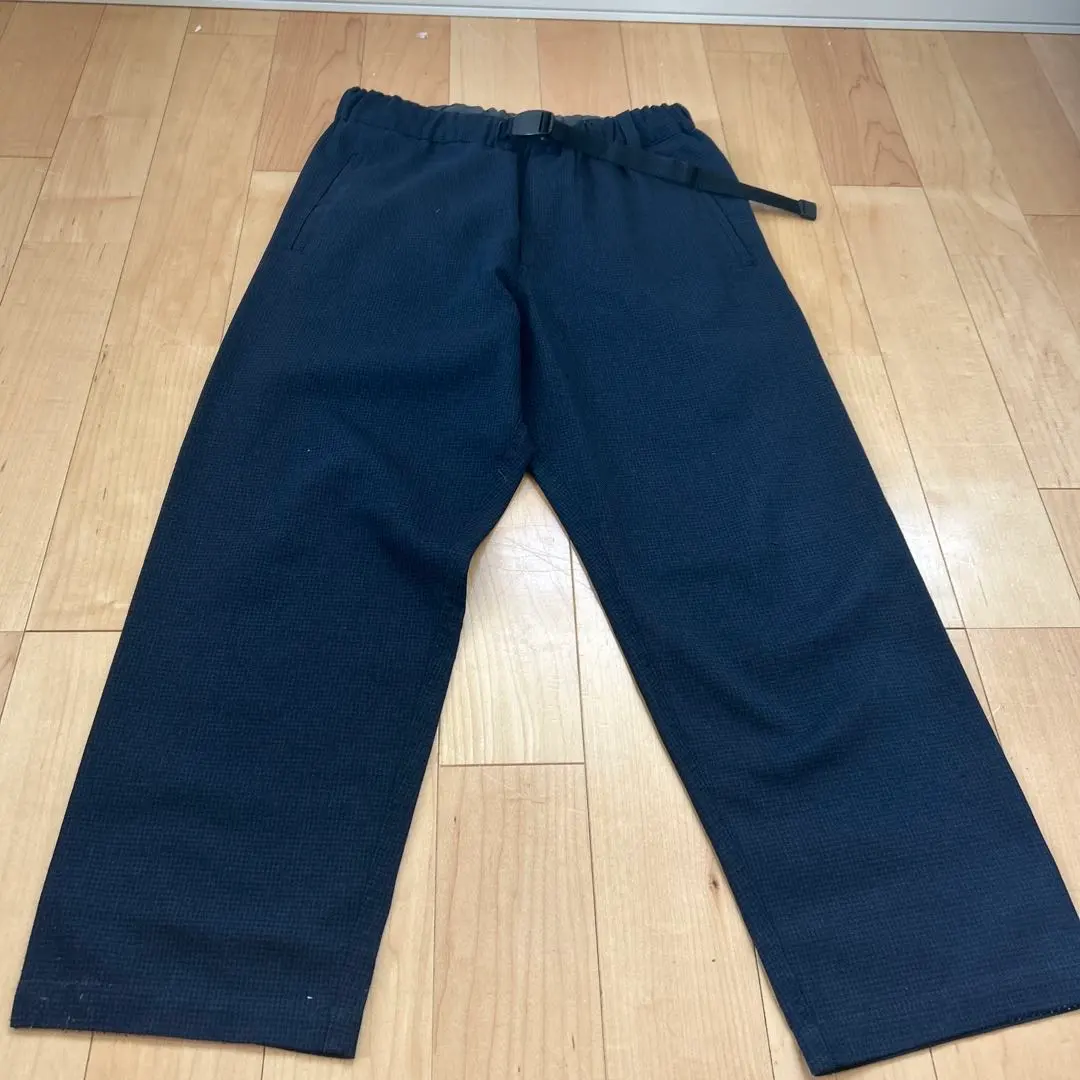 深藍色長褲 的縮圖