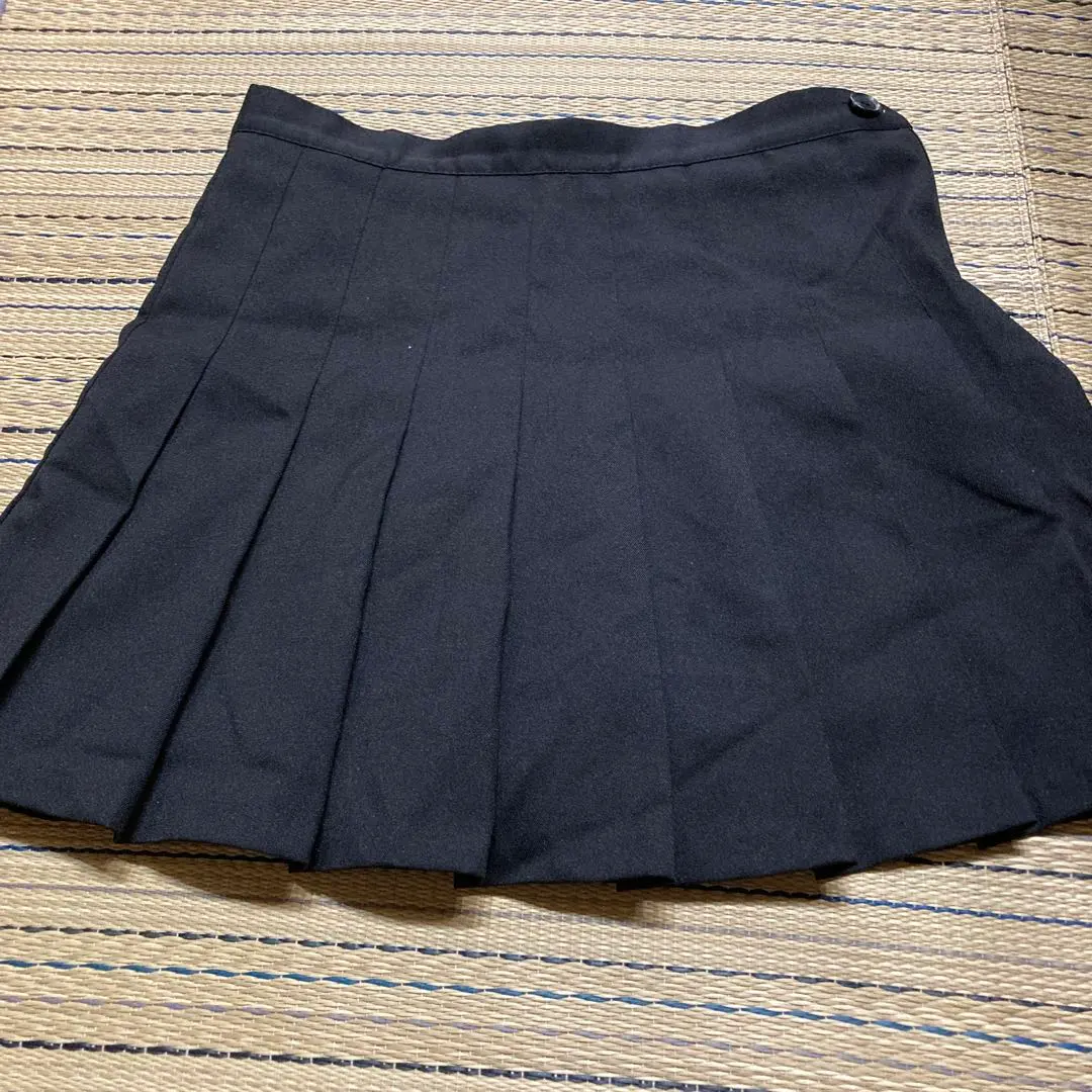 Thumbnail of Black pleated skirt with shorts