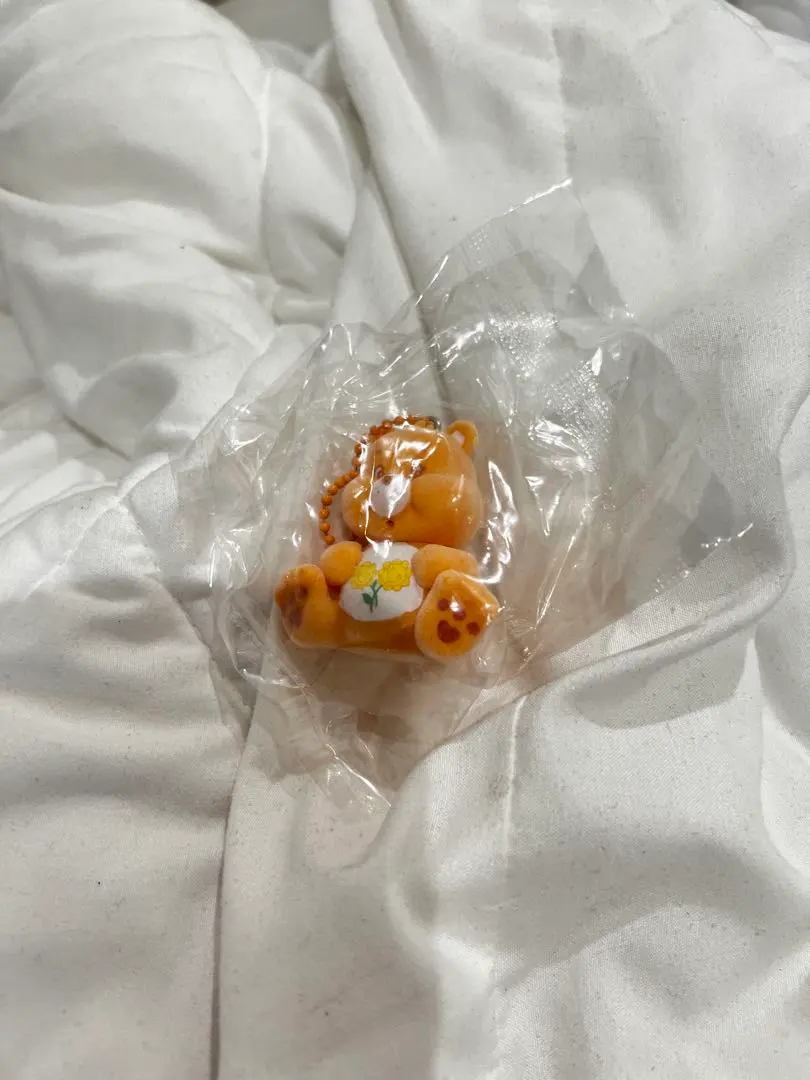 Thumbnail of Care Bear Orange Capsule Toy with Chain, Care Bear, Unopened