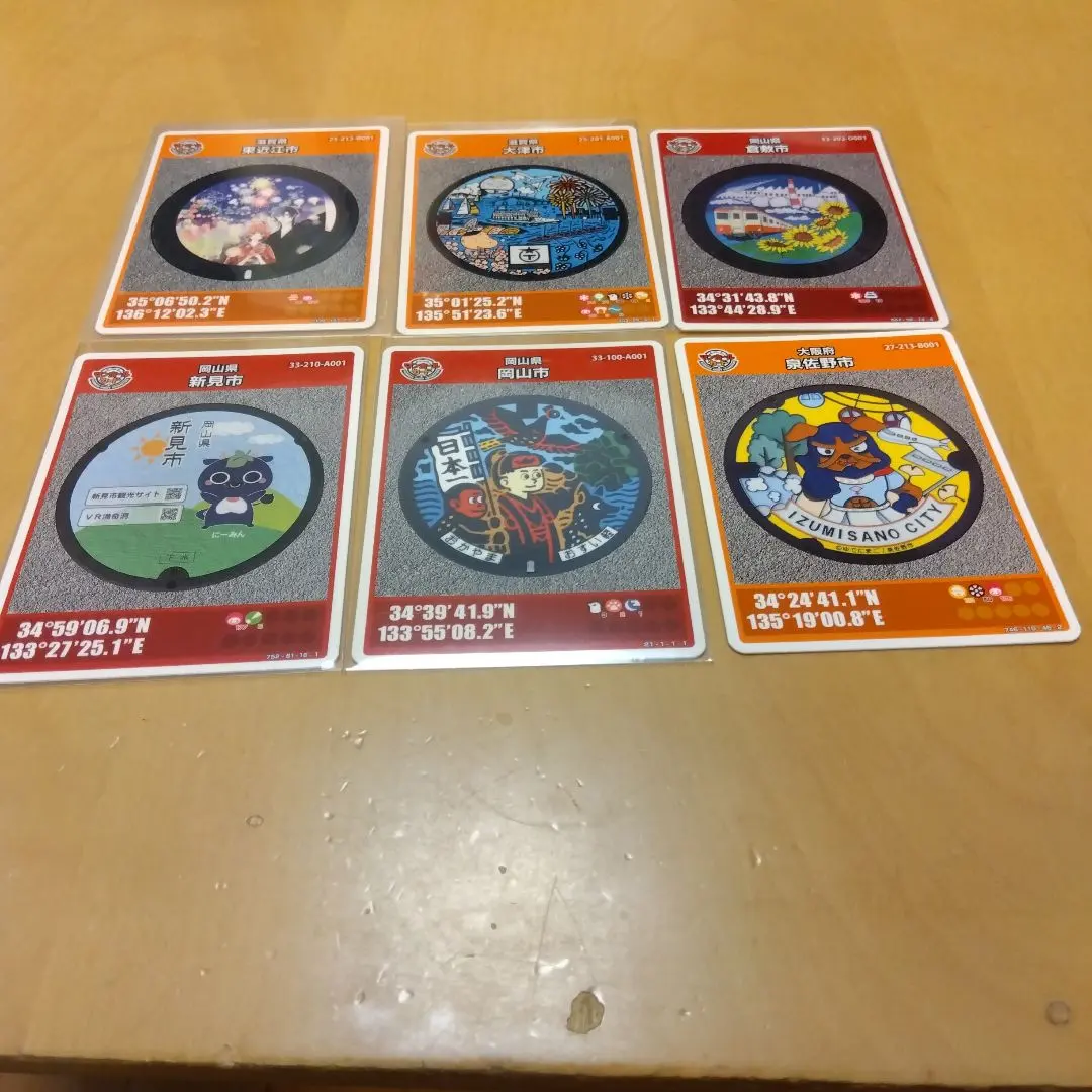 Thumbnail of Set of manhole cards: 3 from Okayama Prefecture, 2 from Shiga Prefecture, 1 from Osaka Prefecture