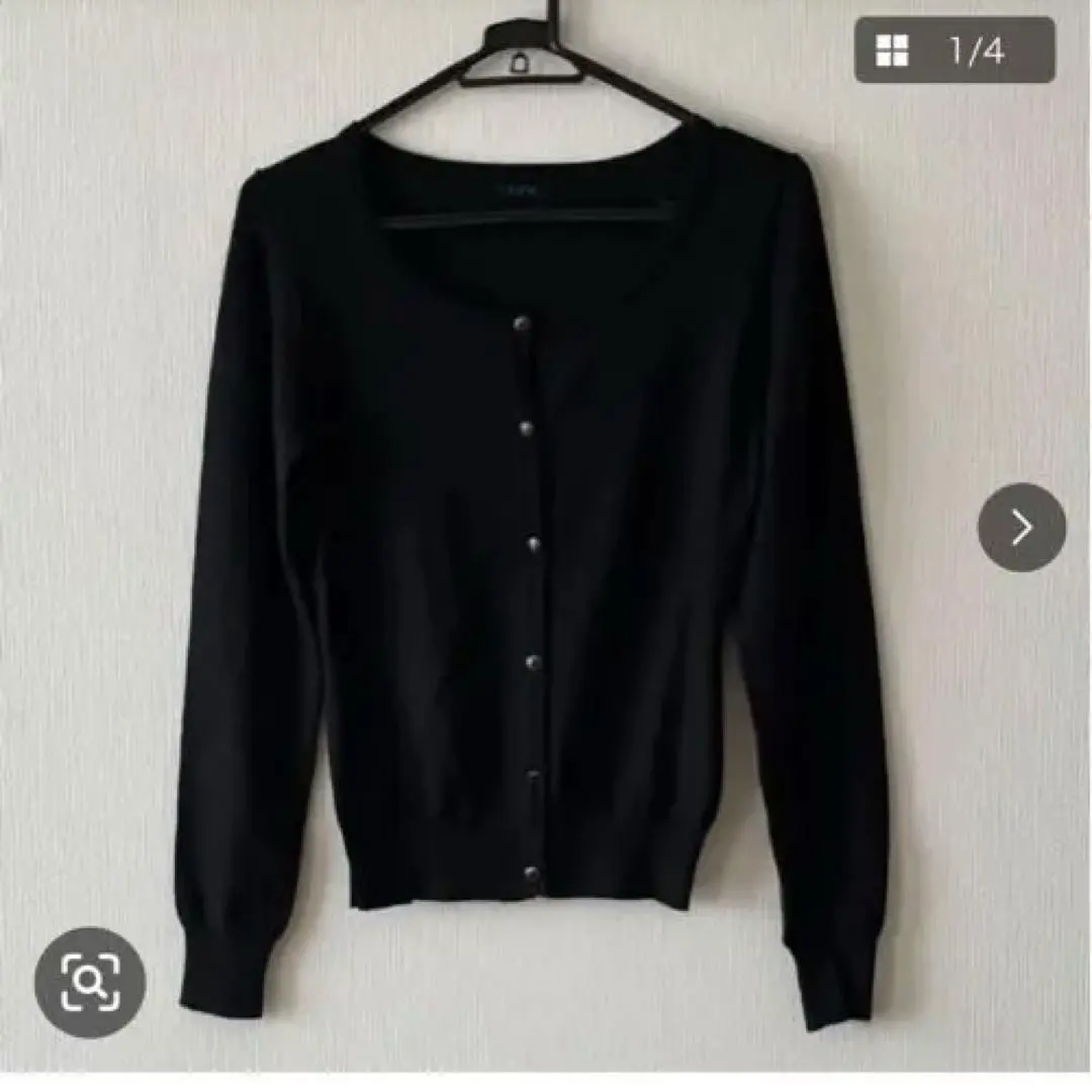 Thumbnail of Black long-sleeved knit cardigan