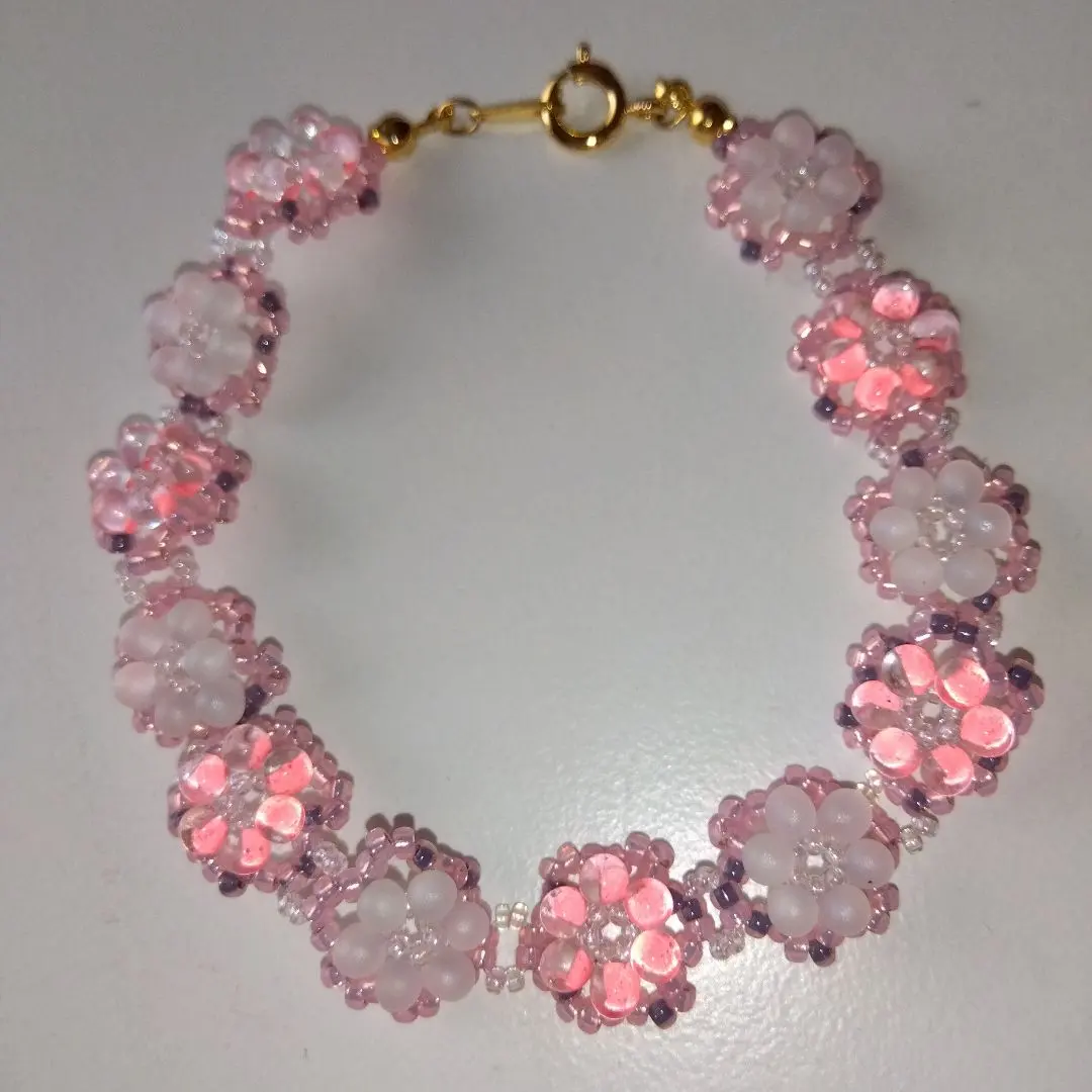 Thumbnail of Flower motif beaded bracelet, pink tones, handmade