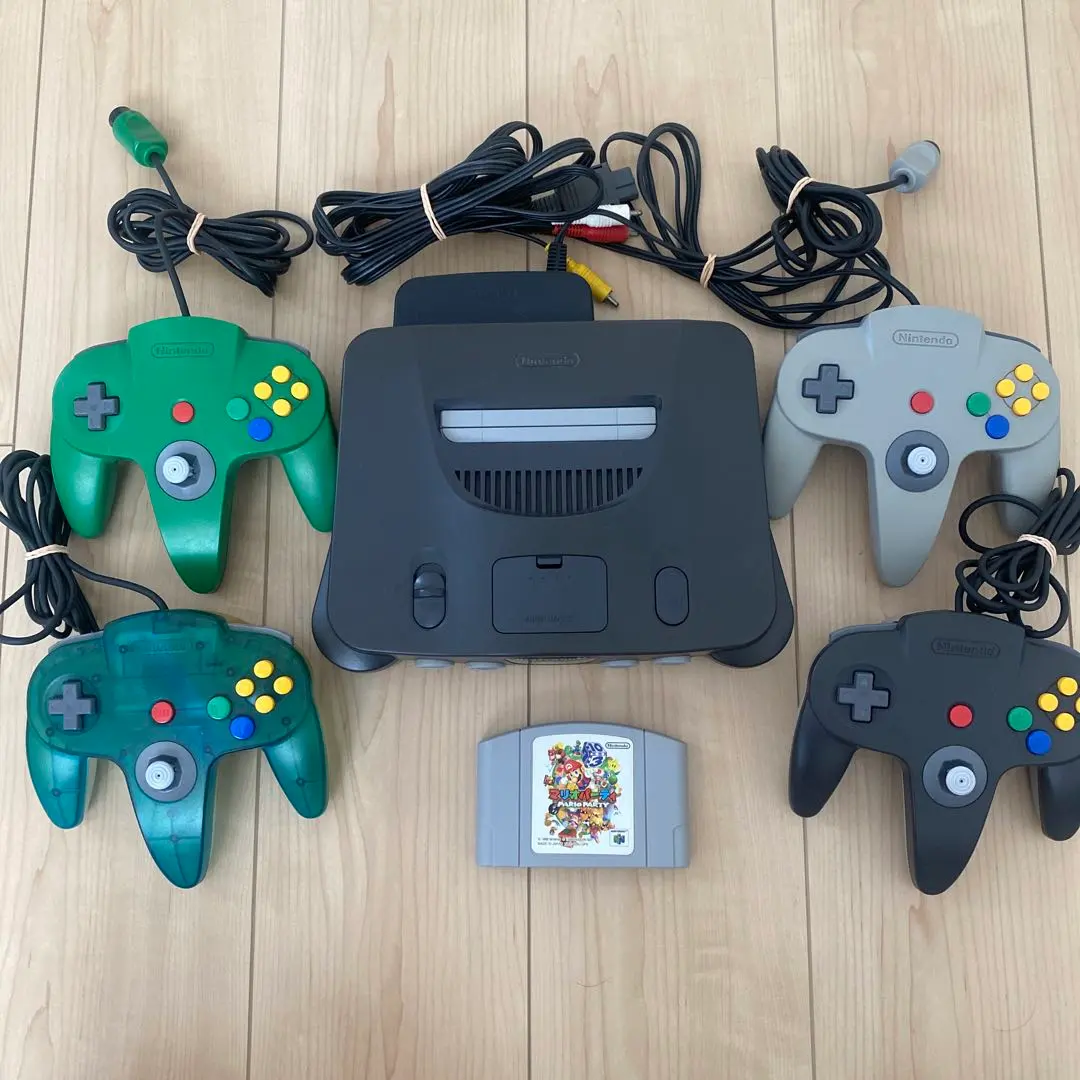 Thumbnail of Nintendo 64 console, 4 controllers, and Mario Party - bundled set