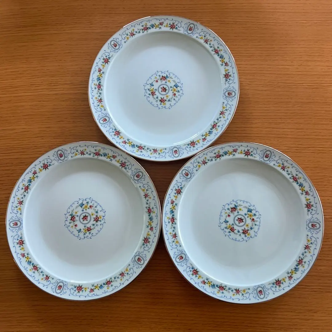 Thumbnail of Noritake porcelain plates with floral decoration, 3 pieces, blue