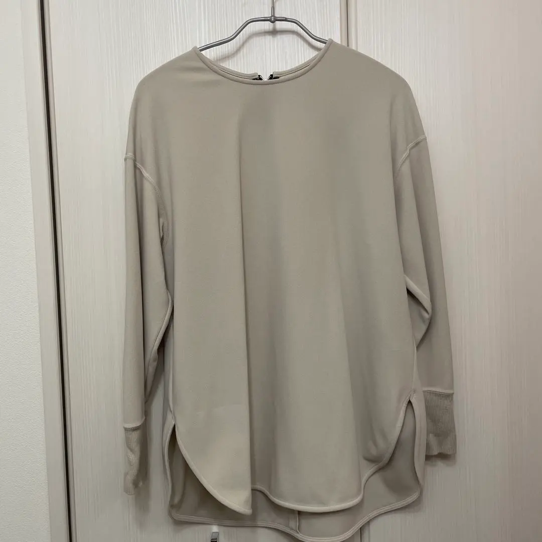 Thumbnail of ISHIKAWALABO Beige Side Slit Long Sleeve Cut-and-Sewn Top