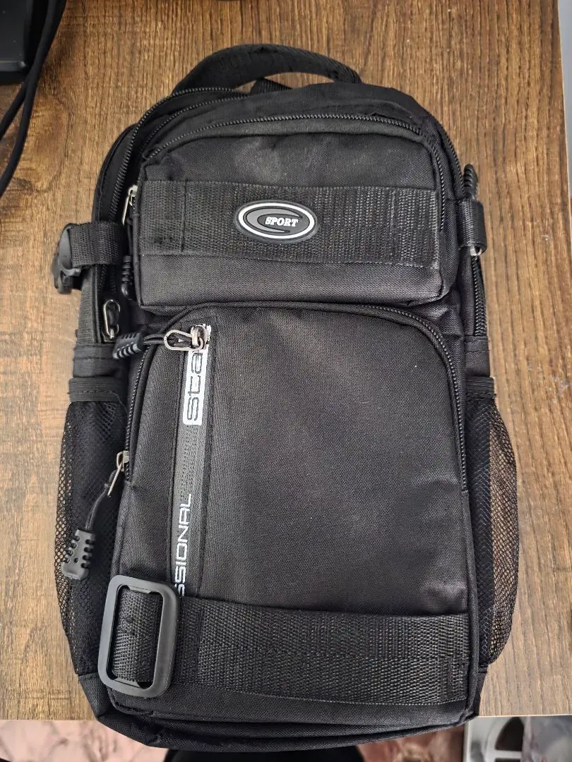 Thumbnail of Black shoulder bag with mesh pocket