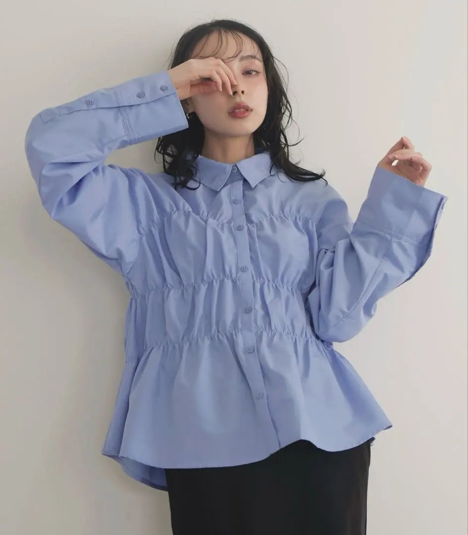 Thumbnail of Light blue gathered shirt, long sleeves