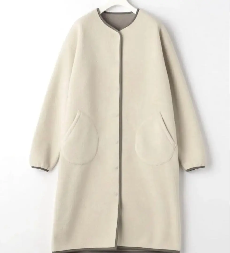 Thumbnail of Cream-colored fleece-style long coat