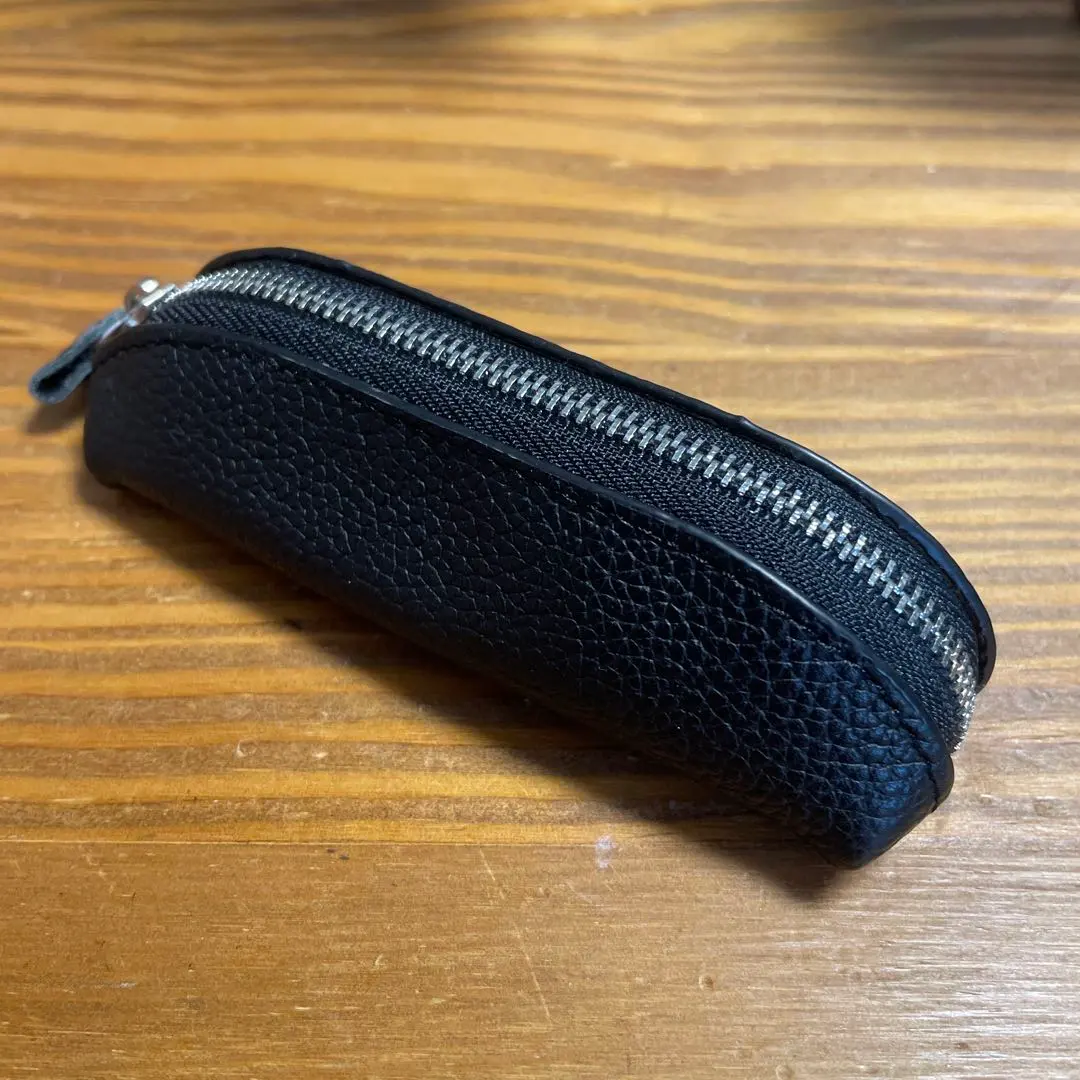 Thumbnail of Black leather coin case