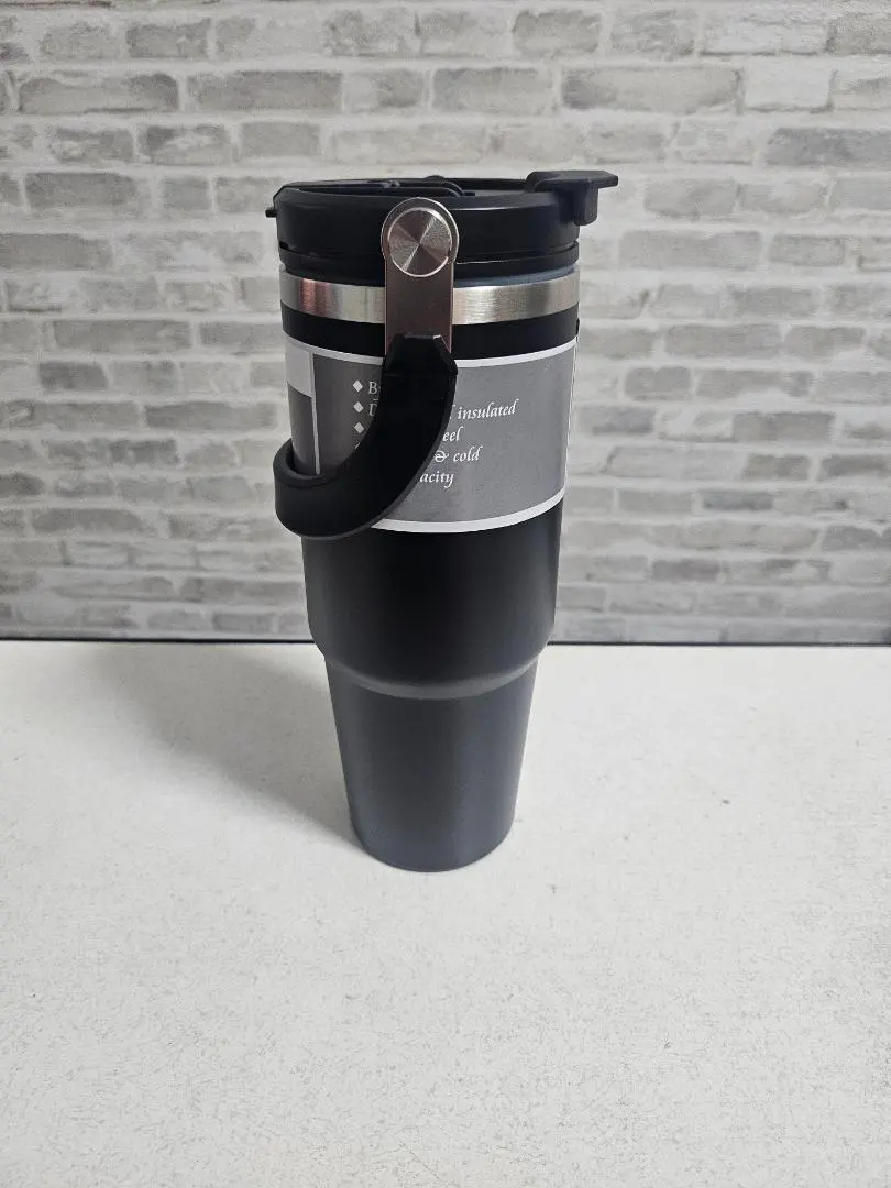 Thumbnail of Black tumbler with lid and handle