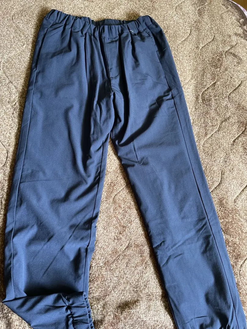 Thumbnail of Uniqlo fleece-lined pants, size 140, navy blue