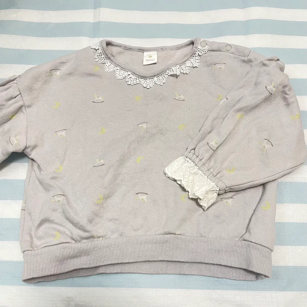 Thumbnail of Fleece-lined sweatshirt with a rocking horse pattern