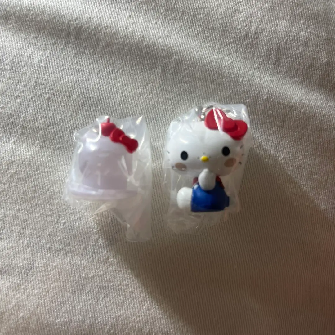 Thumbnail of New, unopened Monchhichi x Hello Kitty Mejirushi Accessory Monchhichi