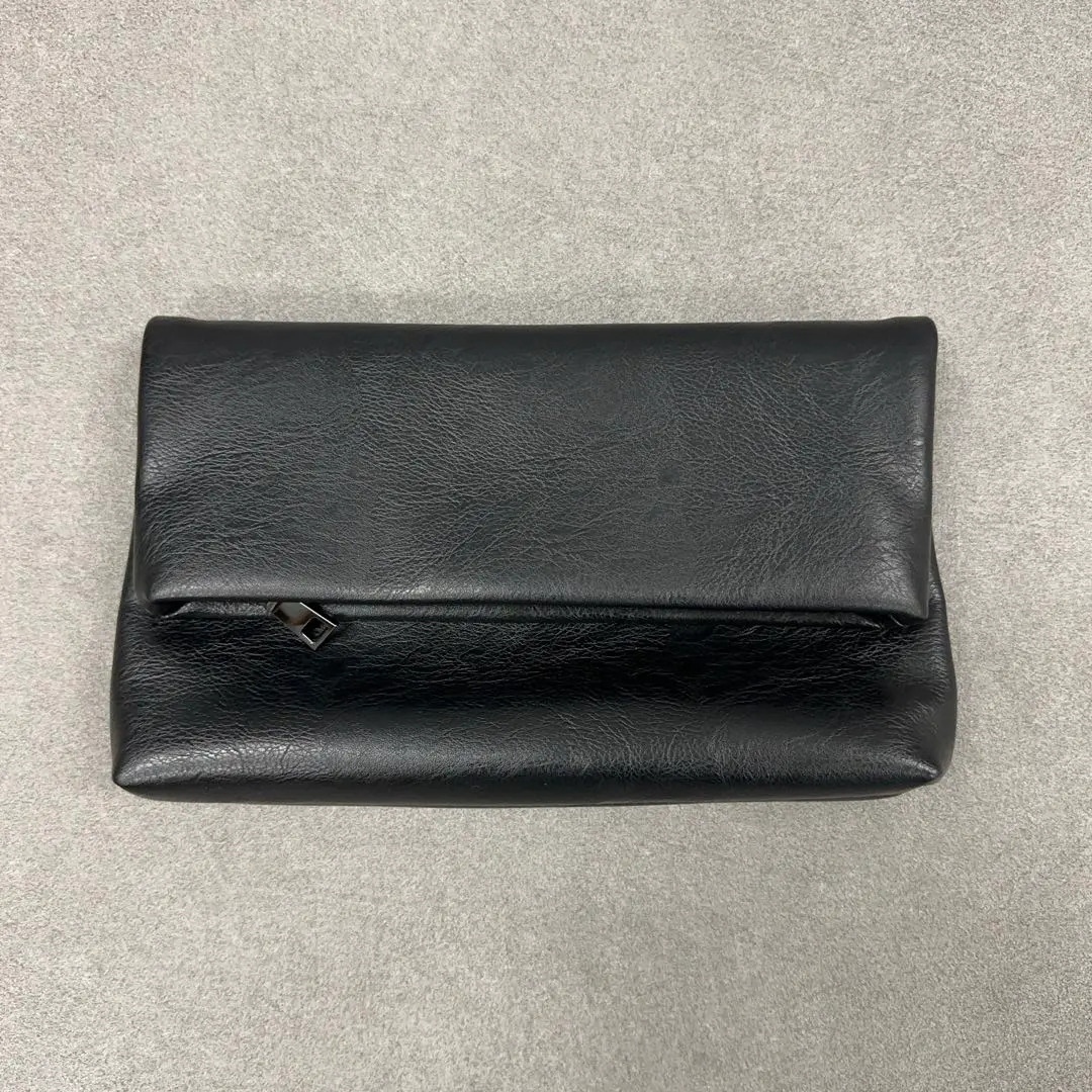 皮革手拿包 黑色 簡約設計 男女通用 的縮圖