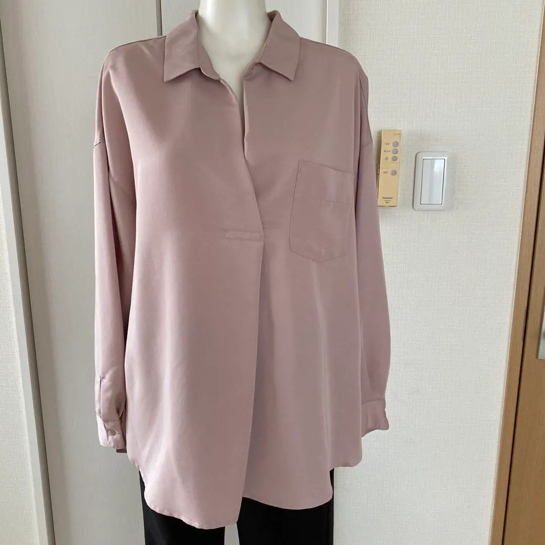 Thumbnail of A pale pink long-sleeved shirt