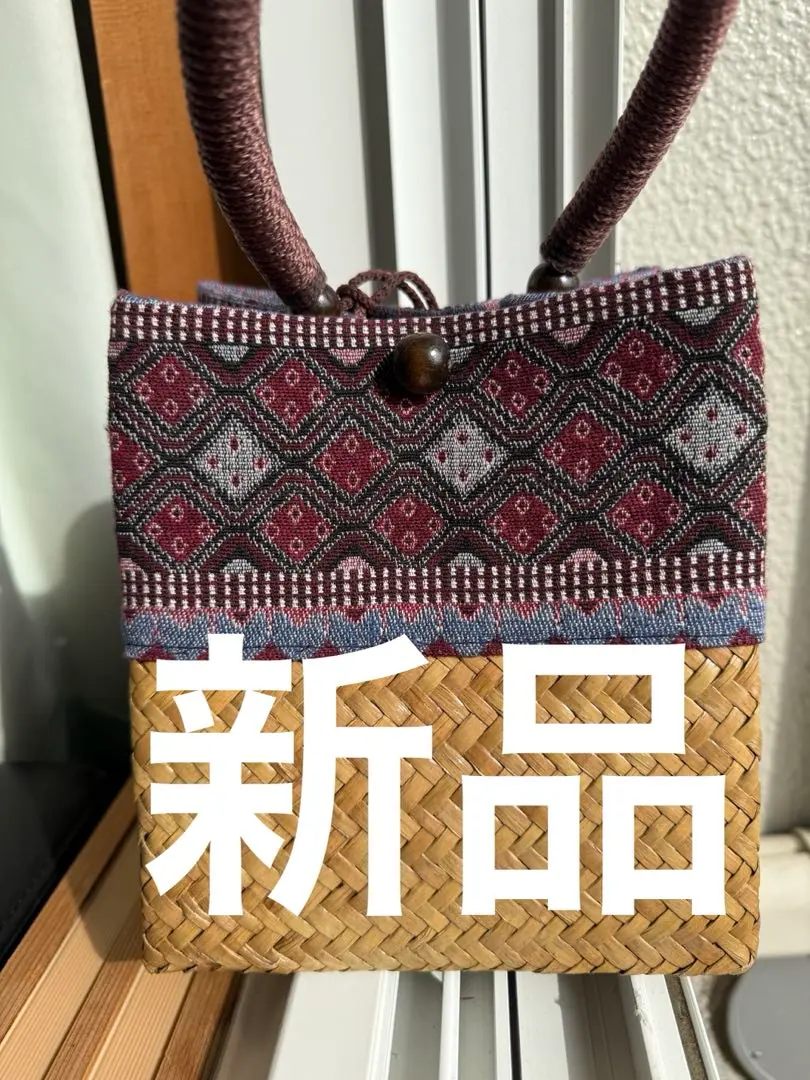 Thumbnail of Geometric patterned rattan basket bag