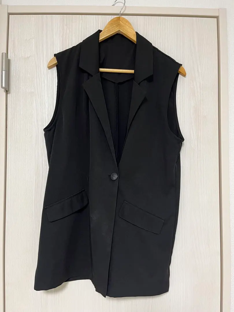 Thumbnail of Black sleeveless jacket