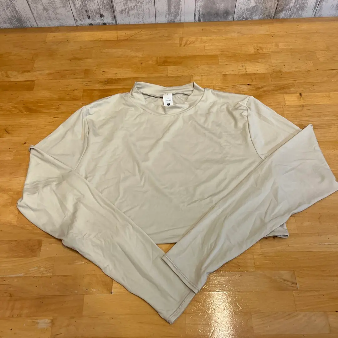 Thumbnail of Lululemon top, cropped length, long-sleeved top, beige color