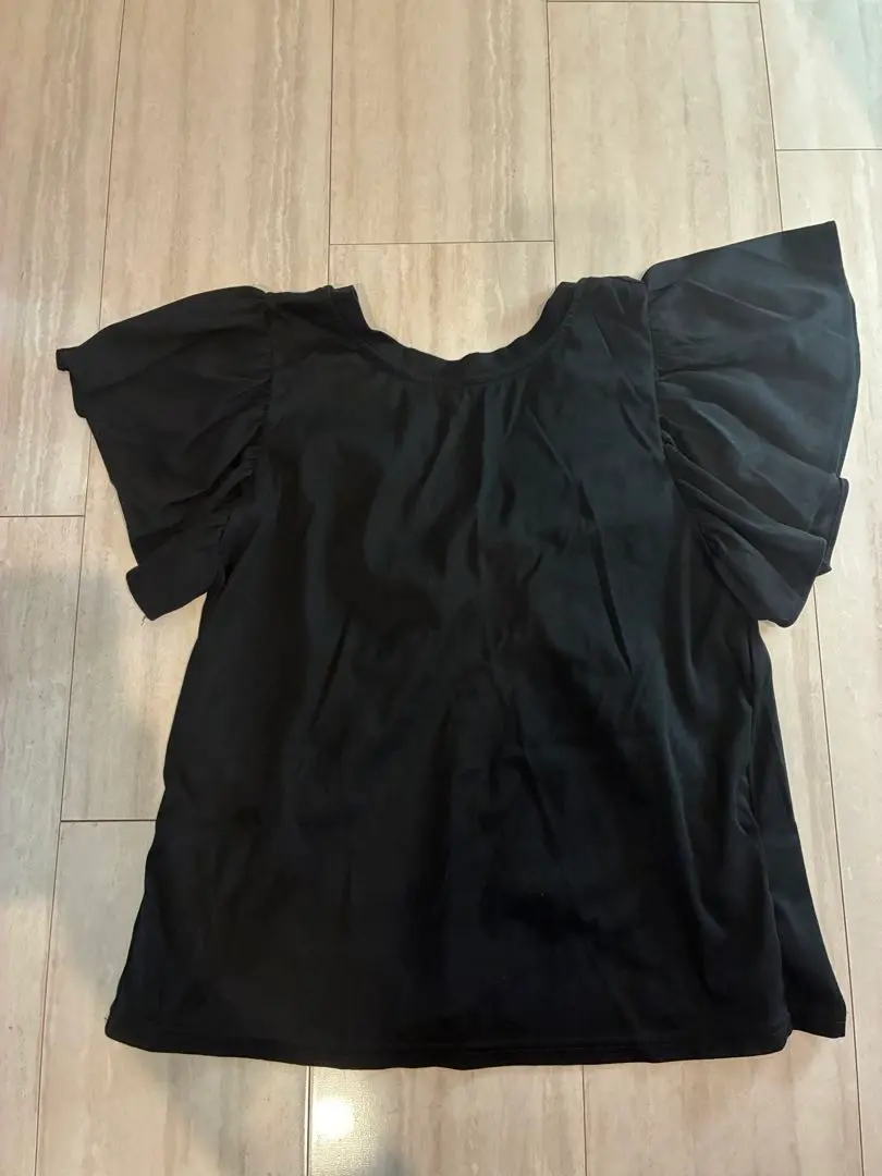 Thumbnail of Black frill sleeve sleeveless top