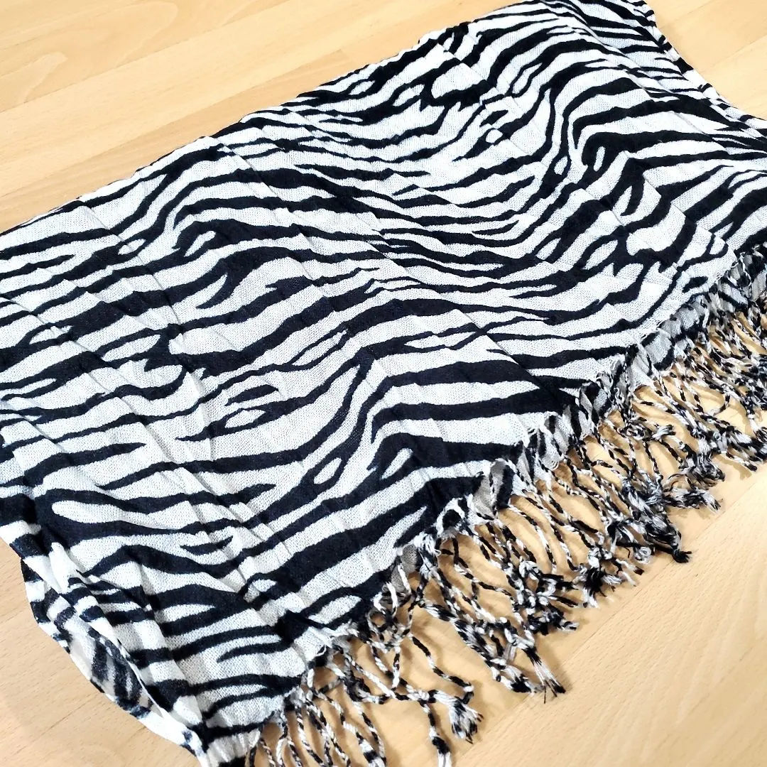 Thumbnail of Anonymous Delivery: Large fringed stole muffler, crinkle finish, zebra pattern, black and white