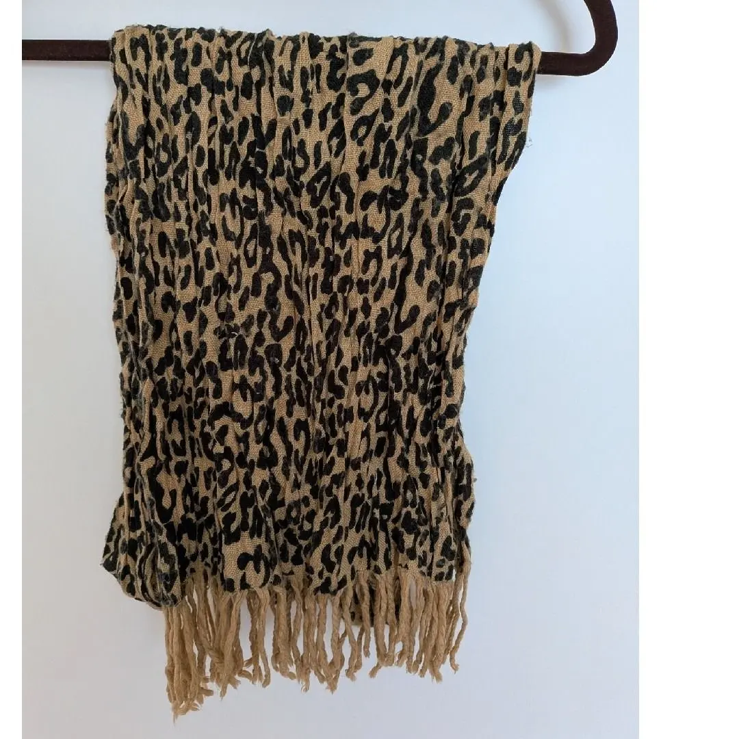 Thumbnail of Leopard print knit scarf with fringe