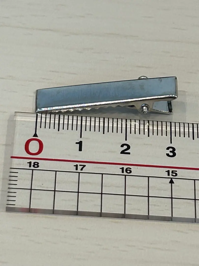 Thumbnail of Set of many metal hair clips, approximately 3cm each