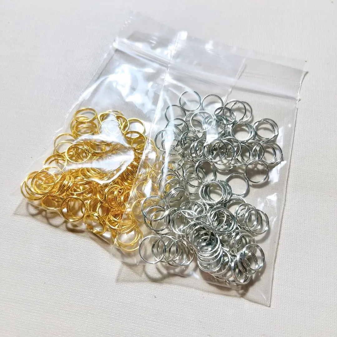 Thumbnail of Double Loop Rings - Gold and Silver Set