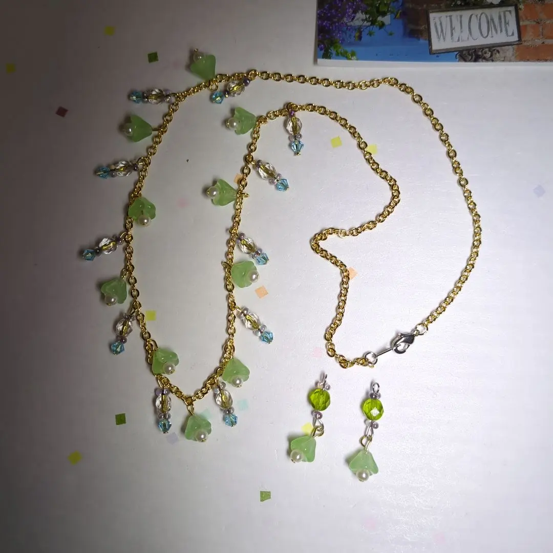 Thumbnail of Green and blue beaded necklace and earring set