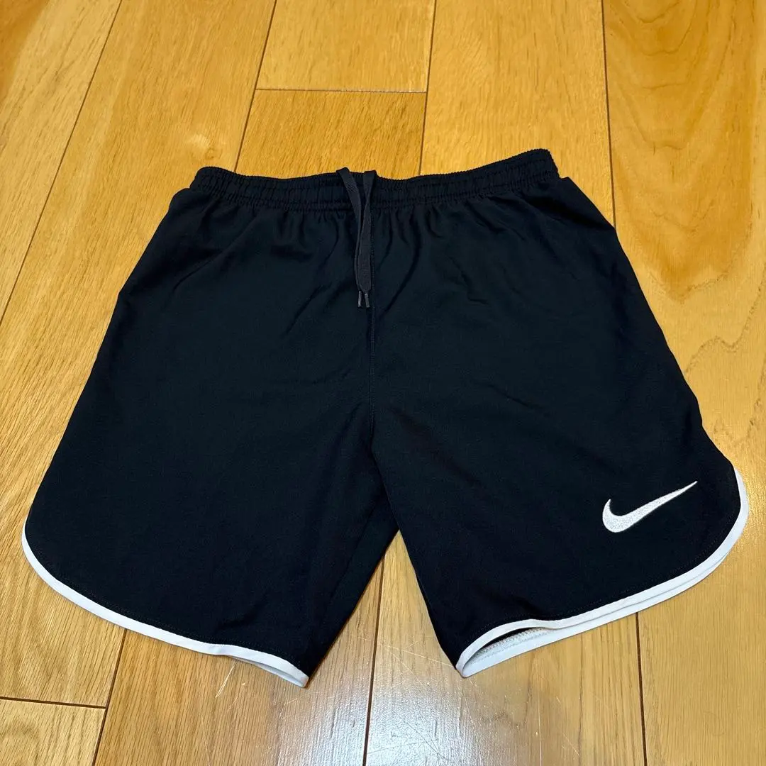 Thumbnail of Nike half pants, size M, black