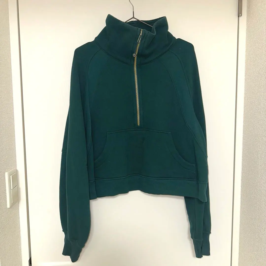Thumbnail of Lululemon Scuba Dark Green Half-Zip Hoodie with Gold accents