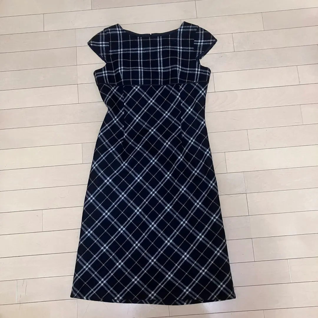 Thumbnail of Black sleeveless knee-length checked BURBERRY long dress