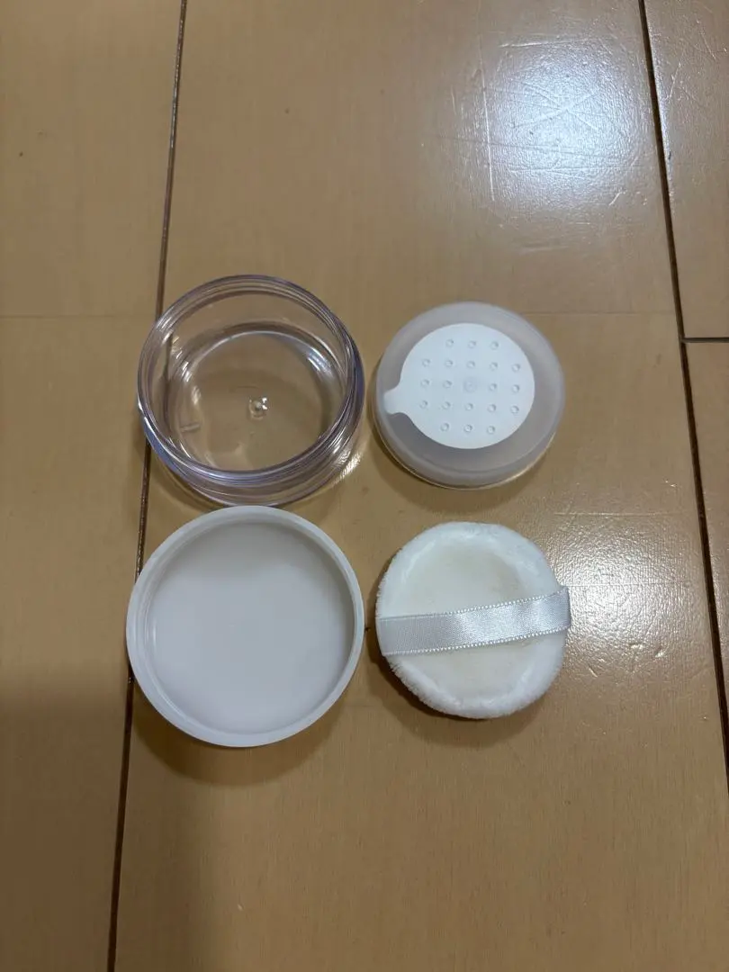 Thumbnail of Loose powder, transparent container, with puff