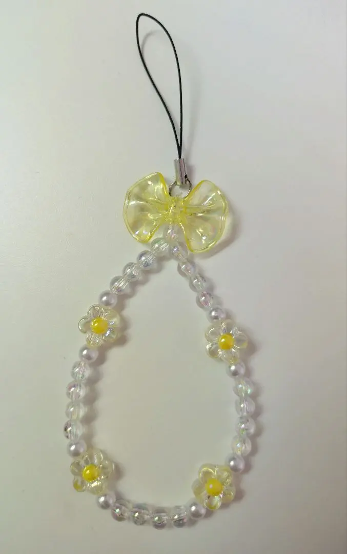 Thumbnail of Handmade strap with flower motif