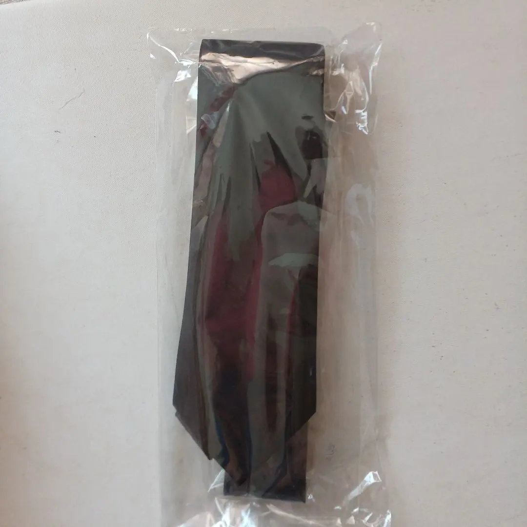 Thumbnail of Black solid tie for formal occasions